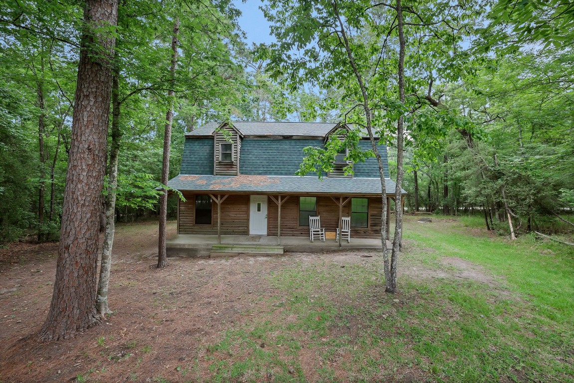 14 North Fairway Loop Coldspring, TX 77331 - Photo 9 of 38 A peaceful, wooded setting