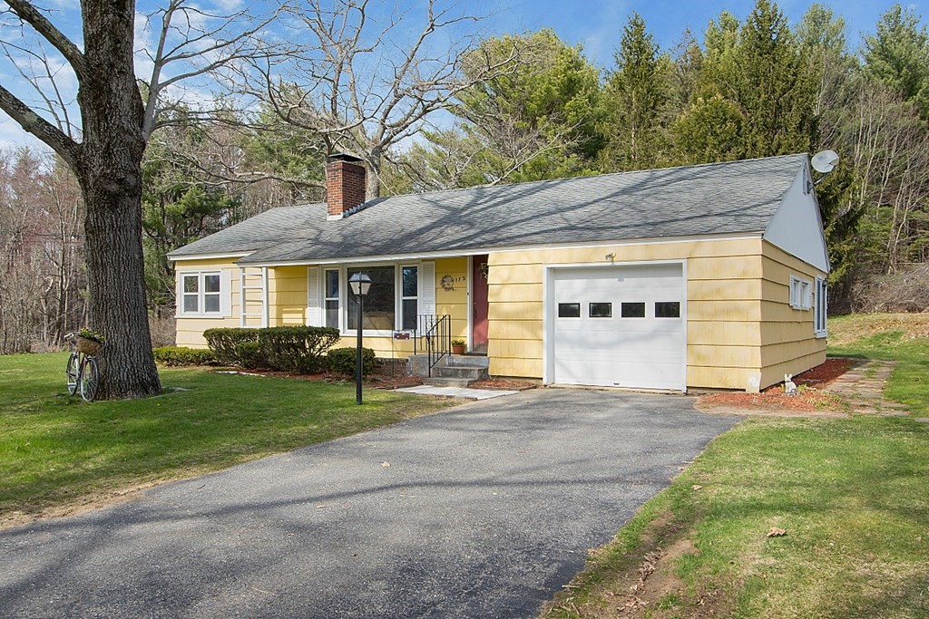 172 Minott Road Gardner, MA 01440 - Photo 1 of 36 a front view of a house with a yard and garage