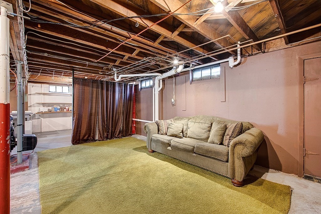 172 Minott Road Gardner, MA 01440 - Photo 23 of 36 a living room with furniture a ceiling fan and a rug