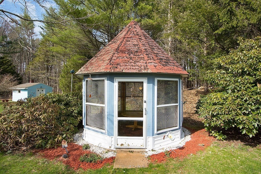 172 Minott Road Gardner, MA 01440 - Photo 31 of 36 a view of a house with yard and plants