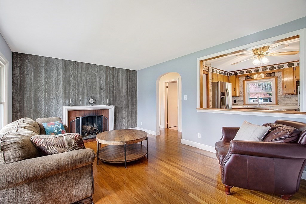 172 Minott Road Gardner, MA 01440 - Photo 6 of 36 a living room with furniture and a fireplace