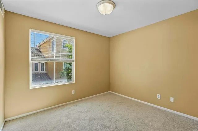 a view of an empty room with window