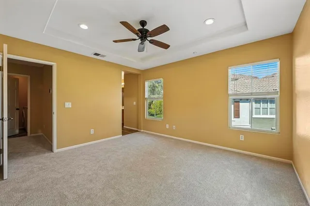 a bathroom with a double vanity sink mirror and shower