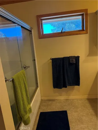 a view of roof deck with patio