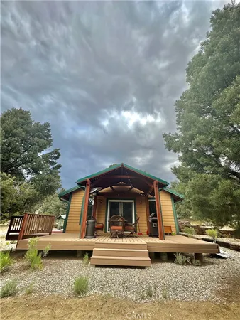 a view of a yard covered in snow