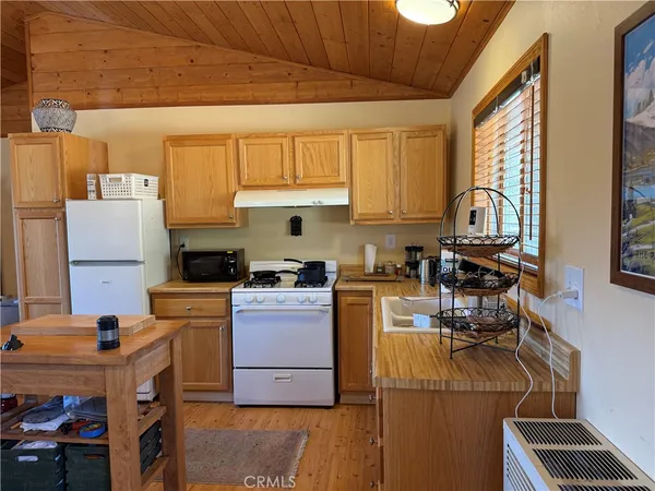 a bed room with a bed and a window