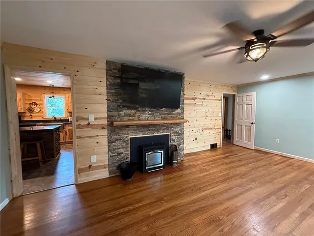 a fireplace with a wooden floor