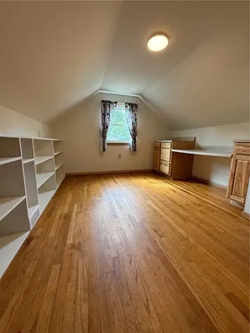 a bathroom with a toilet and a bathtub