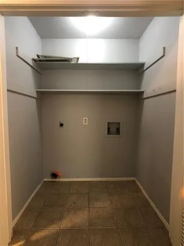 a view of a swimming pool with wooden floor