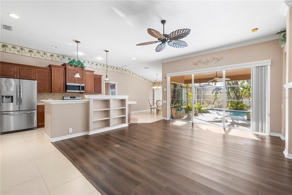 2125 Gold Dust Court New Port Richey, FL 34655 - Photo 13 of 54 a view of a kitchen with a sink and microwave