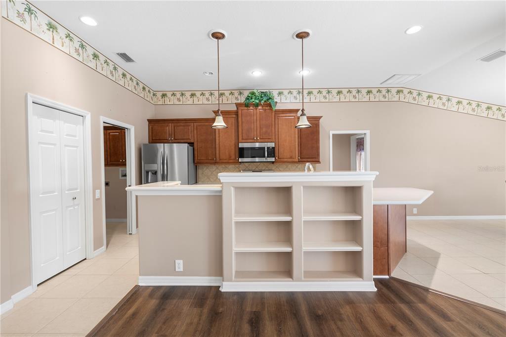 2125 Gold Dust Court New Port Richey, FL 34655 - Photo 18 of 54 a room with cabinets and wooden floor