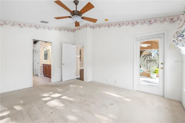 a spacious bathroom with a sink a mirror and a shower