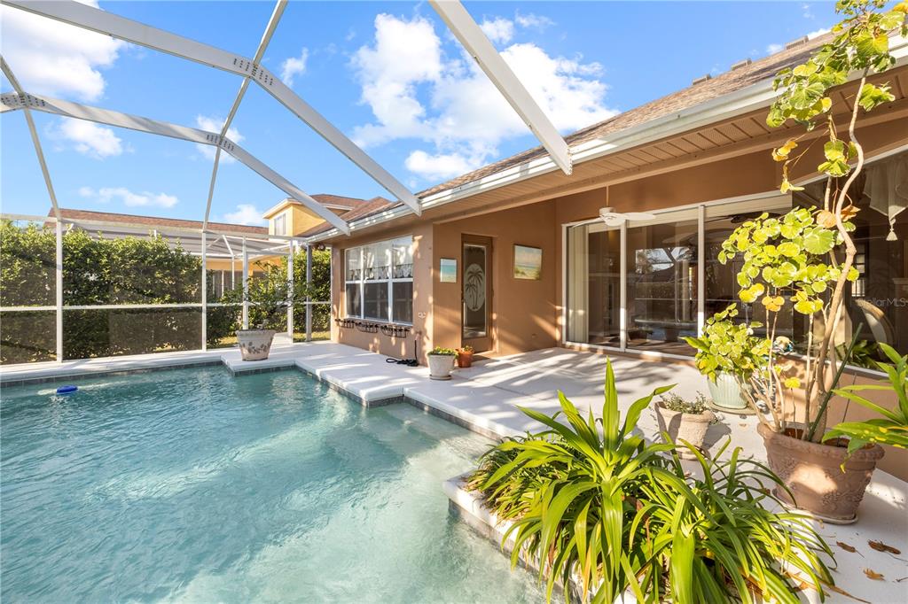 2125 Gold Dust Court New Port Richey, FL 34655 - Photo 49 of 54 a view of a house with backyard porch and sitting area