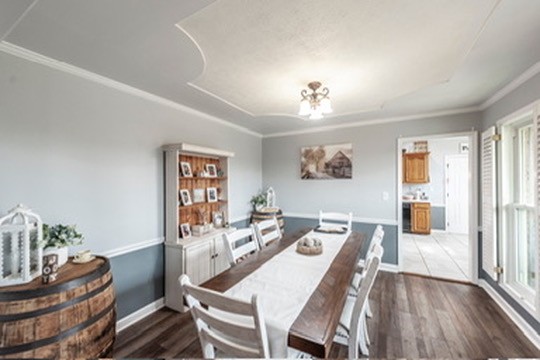1251 Smith Thompson Road Bethpage, TN 37022 - Photo 14 of 71 a view of a dining room with furniture window and wooden floor