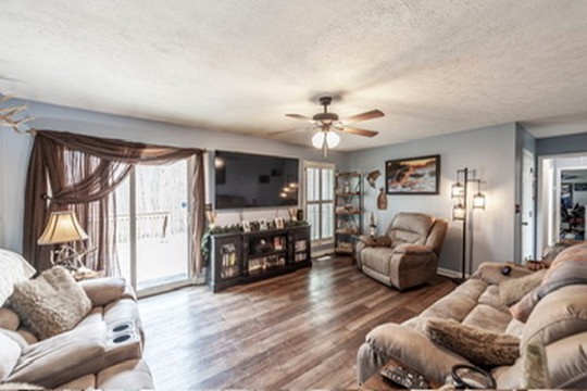 1251 Smith Thompson Road Bethpage, TN 37022 - Photo 25 of 71 a living room with furniture fireplace and a large window