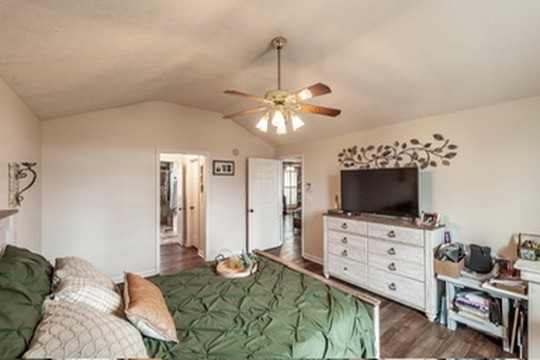 1251 Smith Thompson Road Bethpage, TN 37022 - Photo 30 of 71 a bedroom with furniture and a flat screen tv