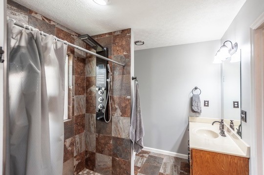 1251 Smith Thompson Road Bethpage, TN 37022 - Photo 36 of 71 a bathroom with a sink and shower