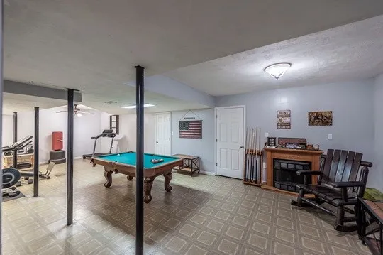 a view of back yard with furniture