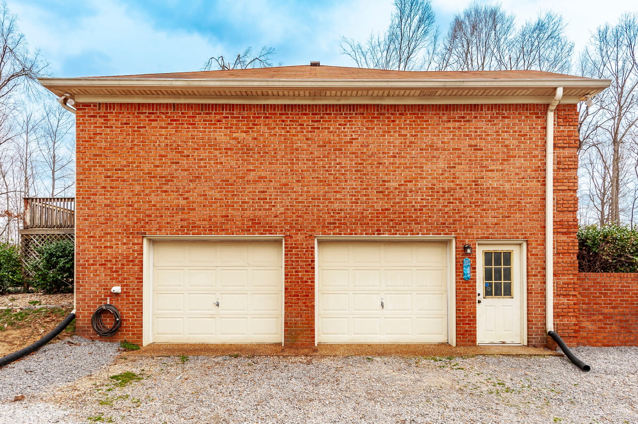 1251 Smith Thompson Road Bethpage, TN 37022 - Photo 52 of 71 a front view of a house with a yard and garage
