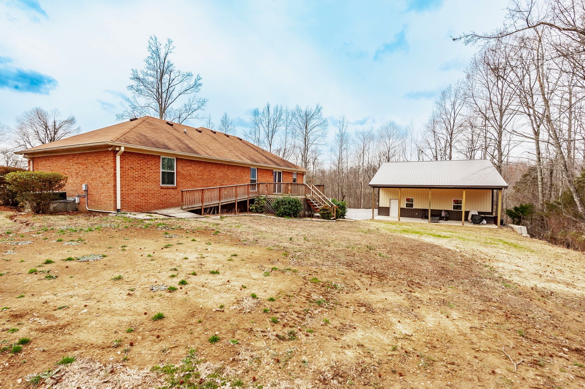 1251 Smith Thompson Road Bethpage, TN 37022 - Photo 54 of 71 a front view of a house with a yard and garage