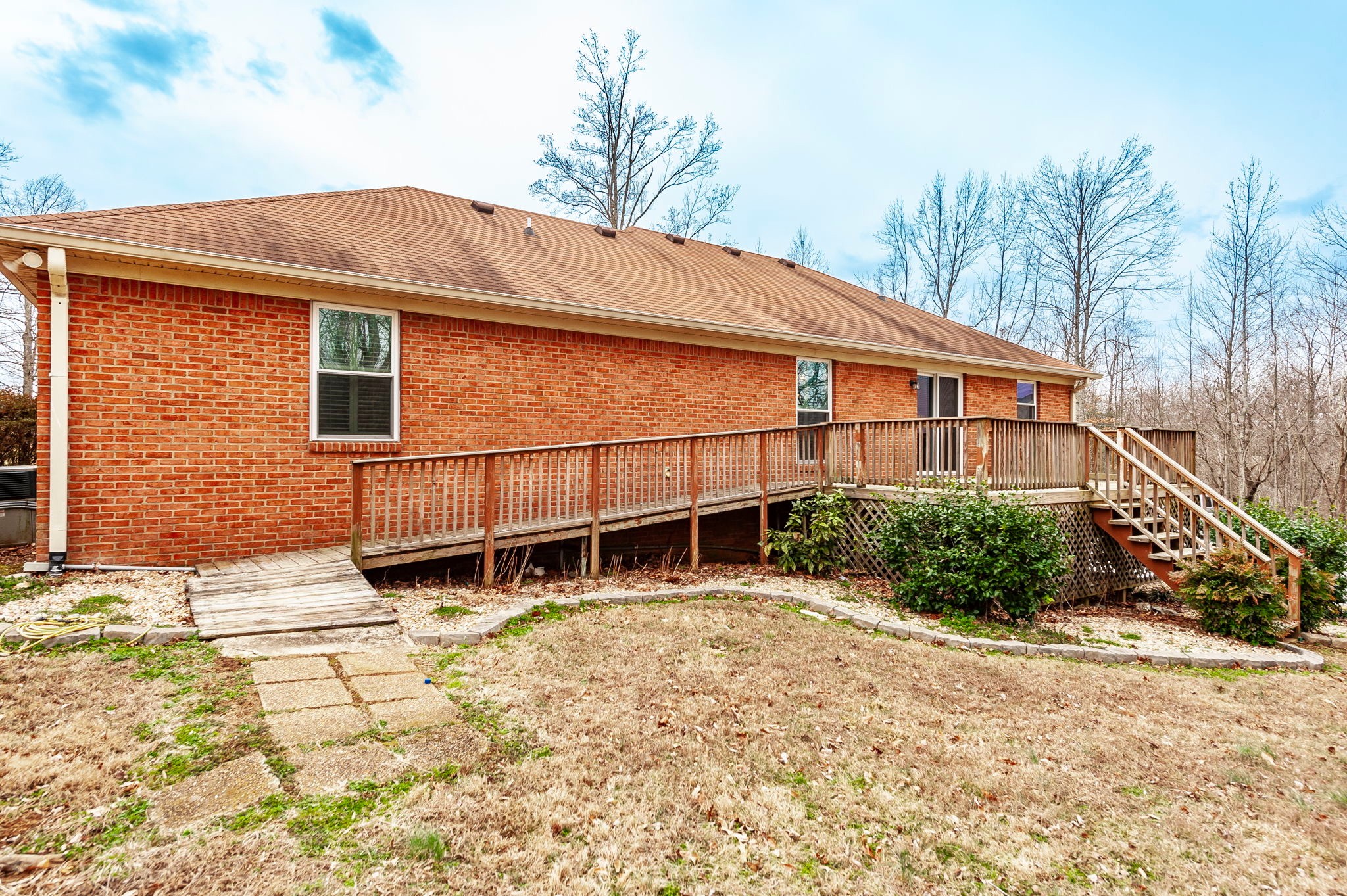 1251 Smith Thompson Road Bethpage, TN 37022 - Photo 56 of 71 a backyard of a house with yard and outdoor seating