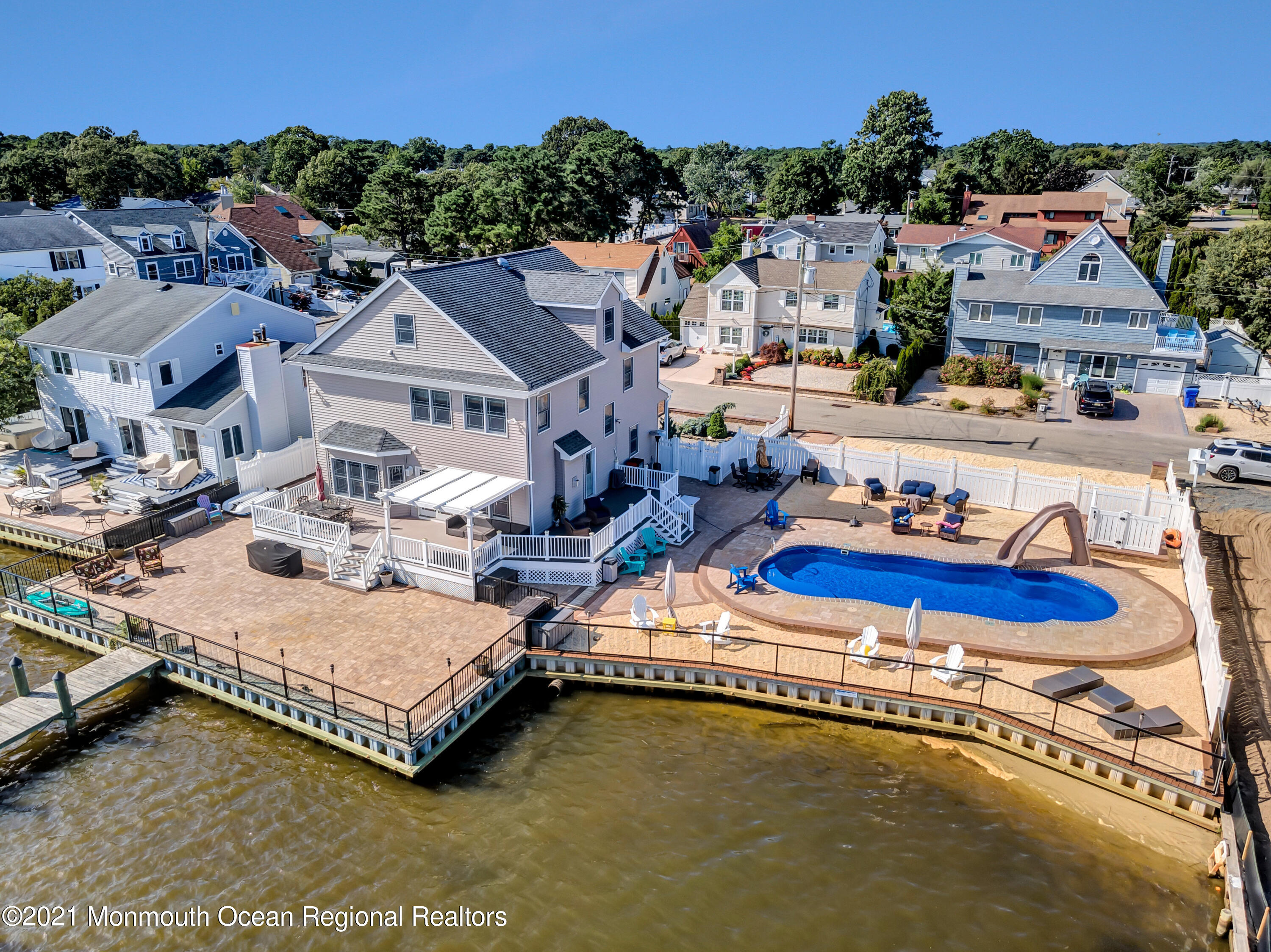 55 Bay Way Brick, NJ 08723 - Photo 11 of 55 a view of a house with pool and chairs