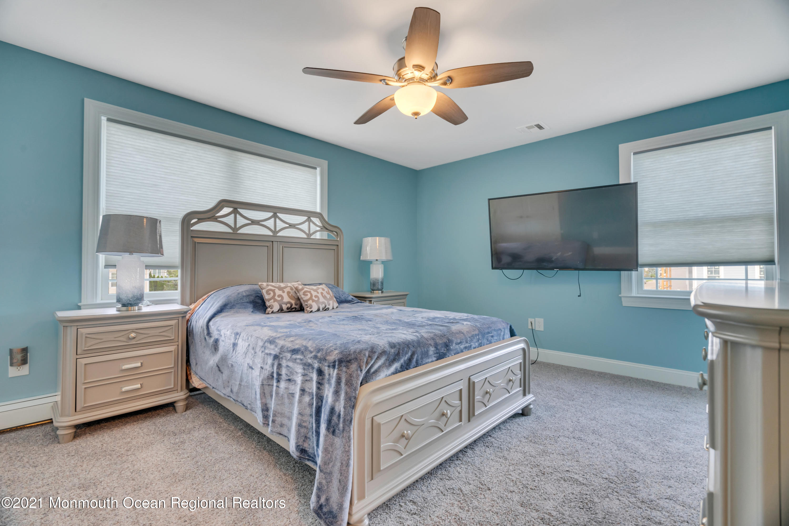 55 Bay Way Brick, NJ 08723 - Photo 25 of 55 a bedroom with a bed and a flat screen tv