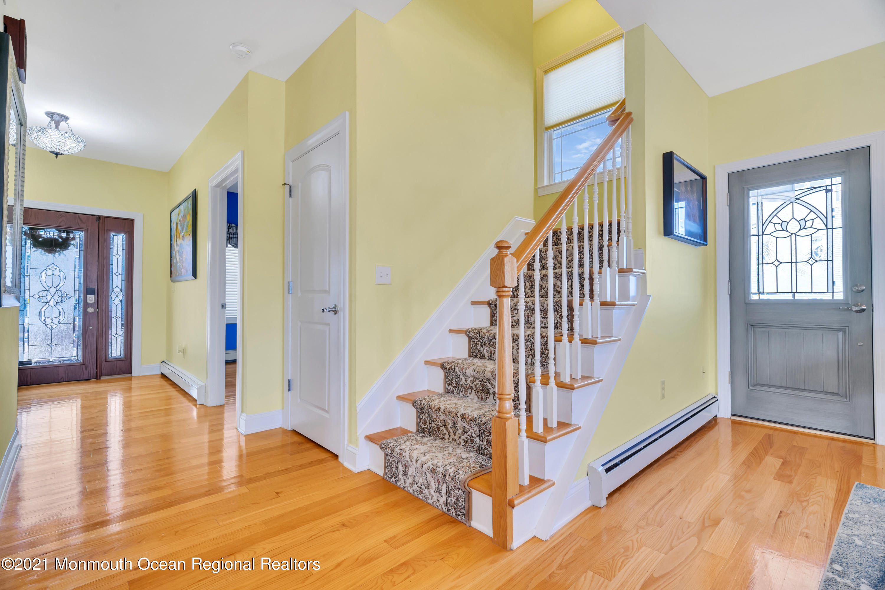 55 Bay Way Brick, NJ 08723 - Photo 3 of 55 a view of an entryway with wooden floor and windows