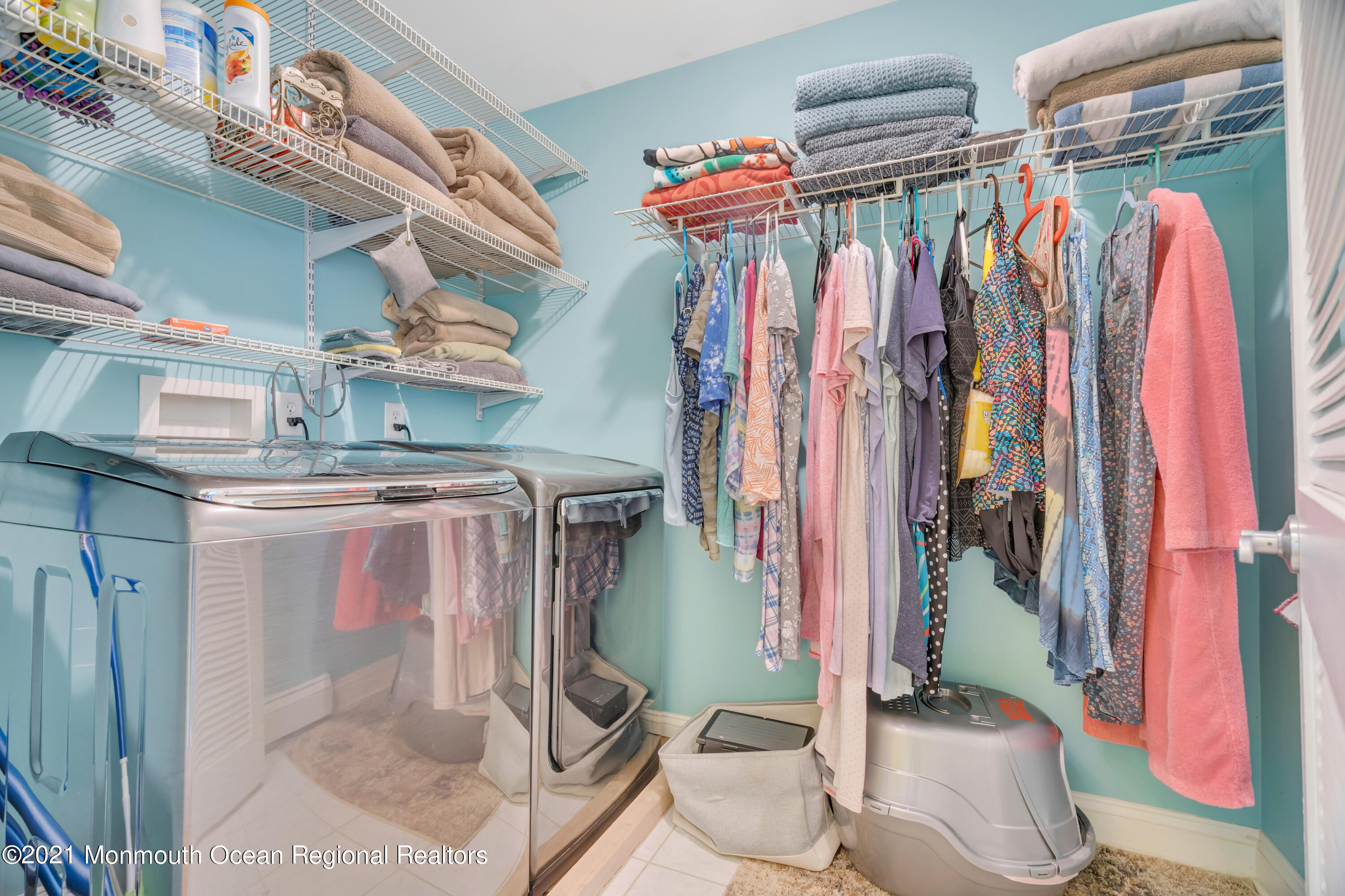 55 Bay Way Brick, NJ 08723 - Photo 32 of 55 a view of walk in closet with clothes and shoes