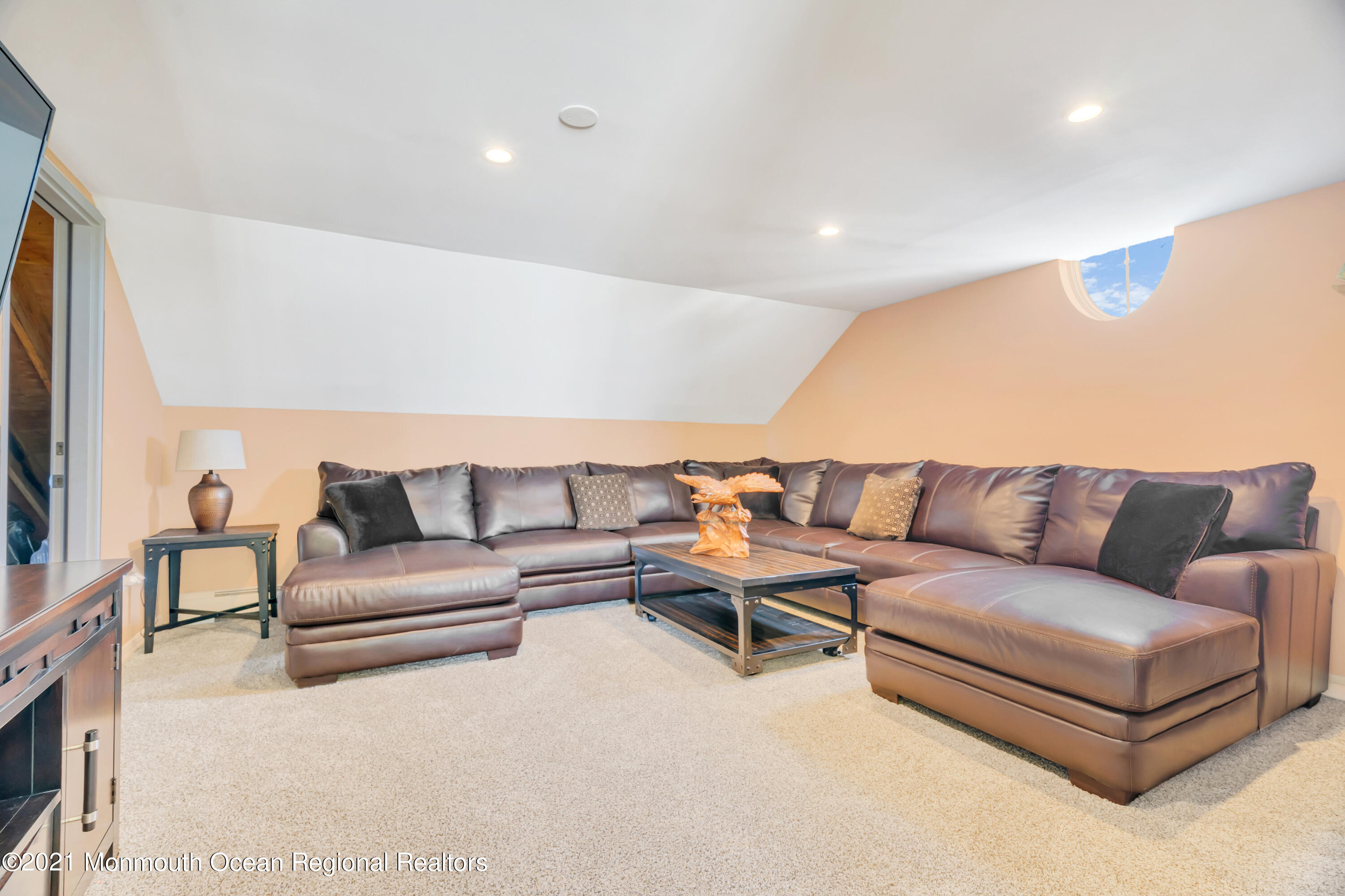 55 Bay Way Brick, NJ 08723 - Photo 35 of 55 a living room with furniture and a flat screen tv