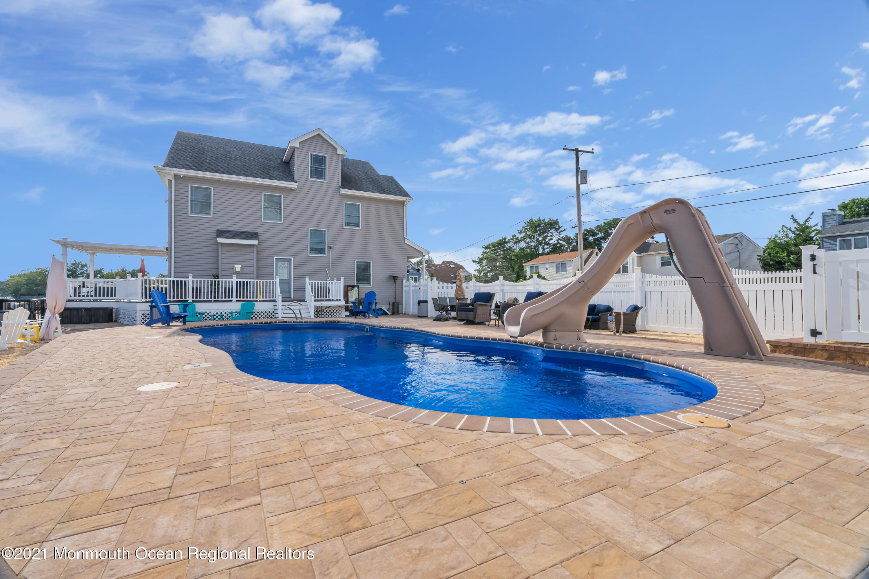 55 Bay Way Brick, NJ 08723 - Photo 39 of 55 a view of swimming pool with outdoor seating
