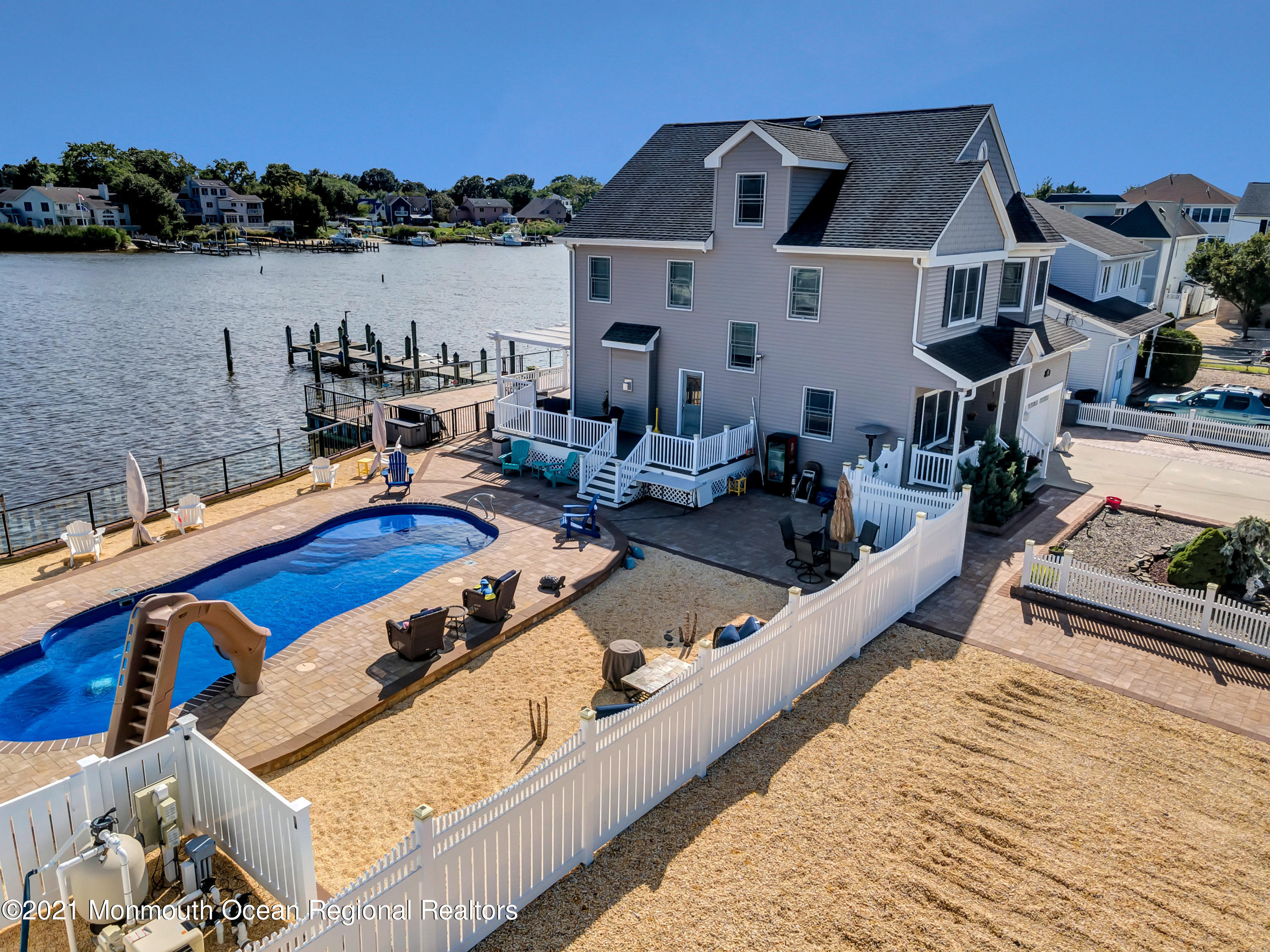 55 Bay Way Brick, NJ 08723 - Photo 41 of 55 a view of a house with pool and chairs