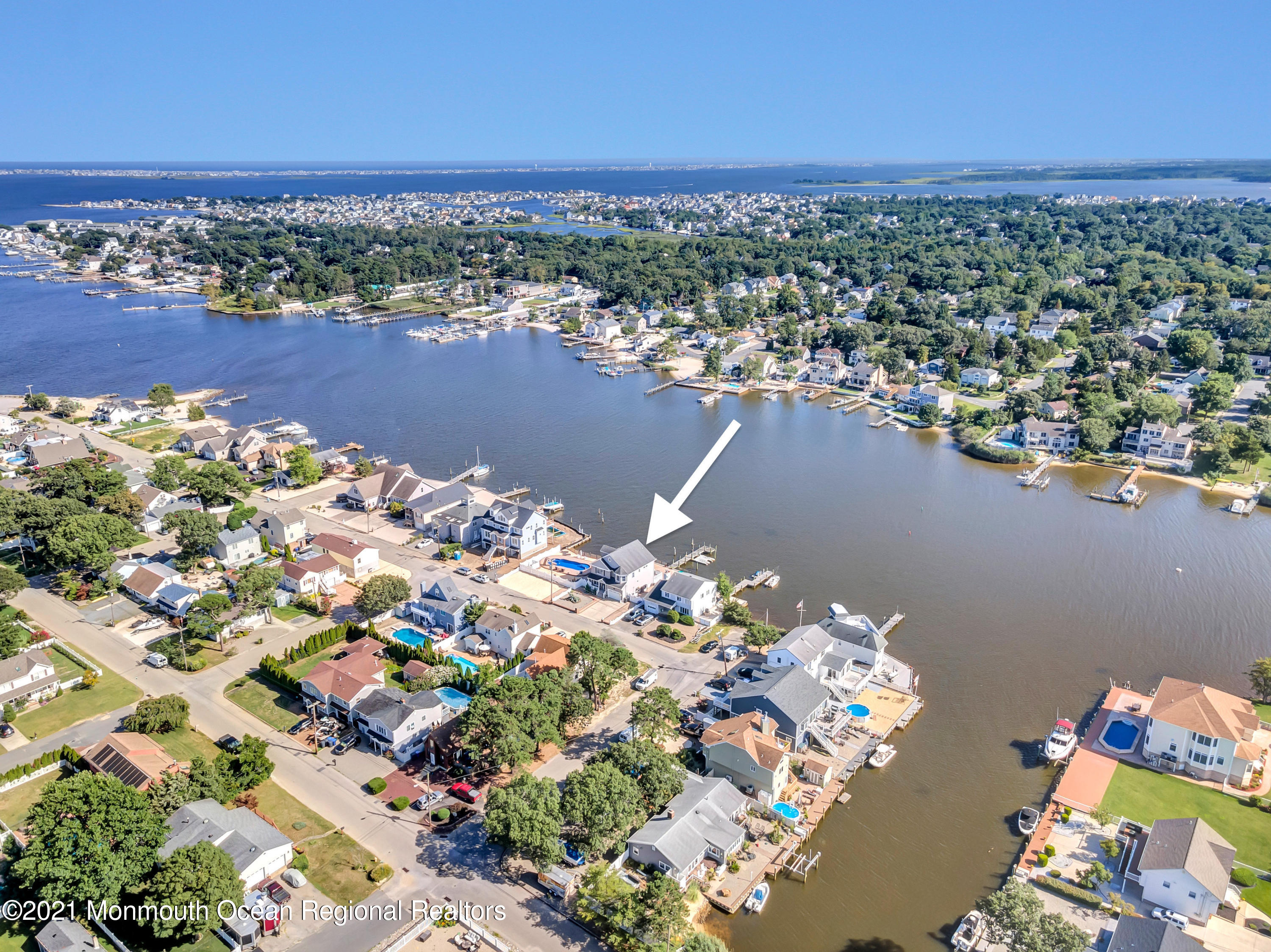 55 Bay Way Brick, NJ 08723 - Photo 43 of 55 an aerial view of a house with a lake