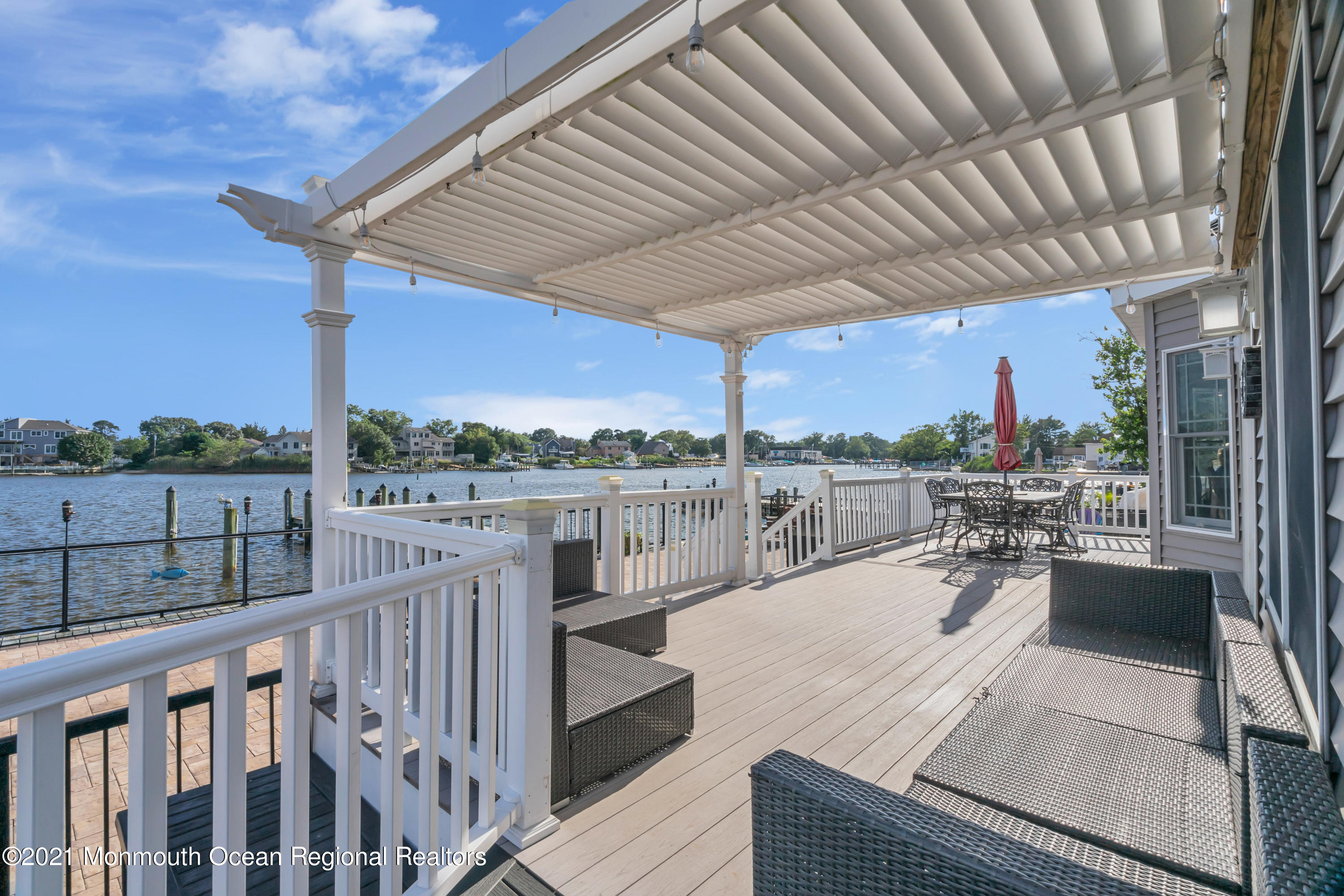 55 Bay Way Brick, NJ 08723 - Photo 48 of 55 a view of a roof deck couches chairs and city view