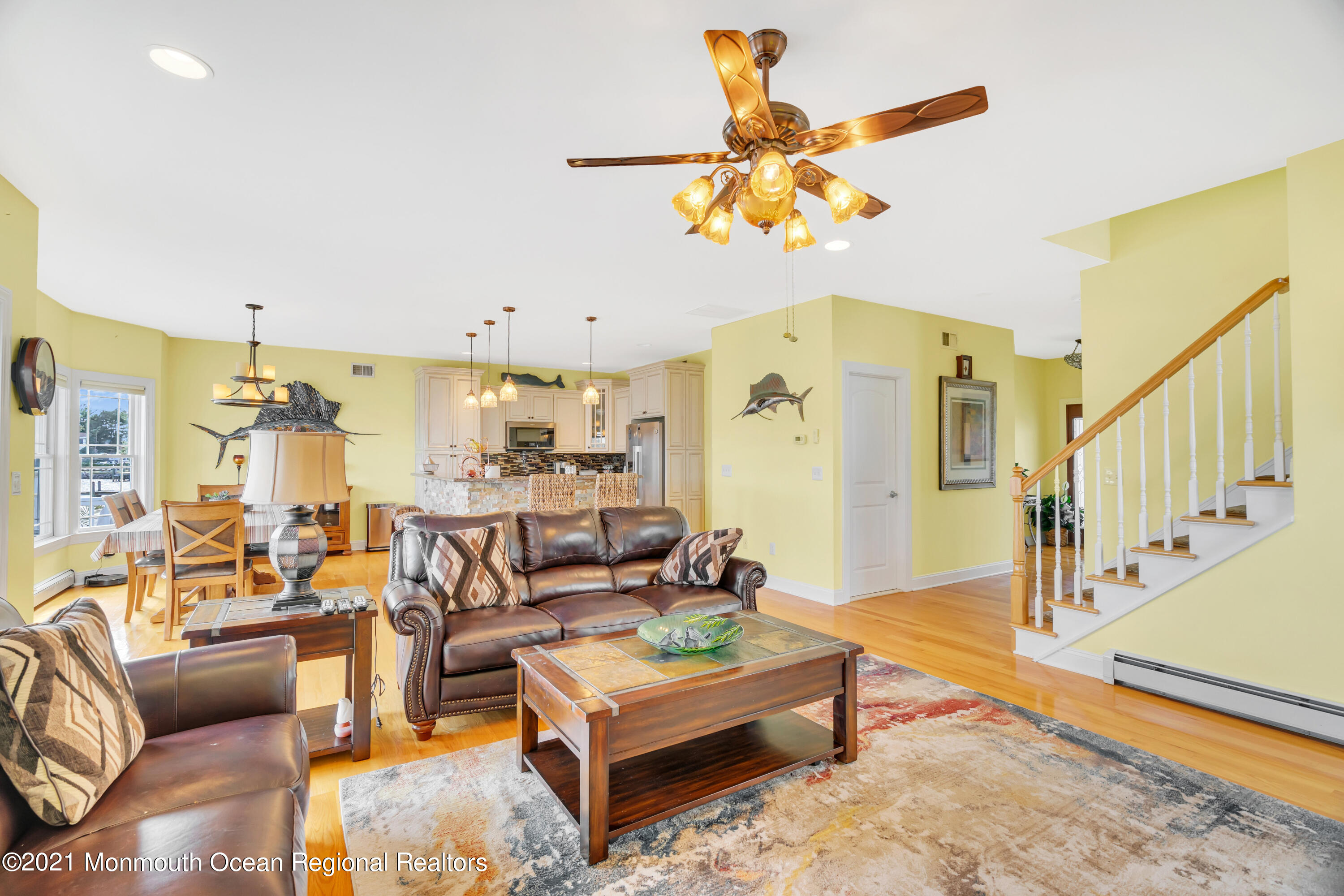 55 Bay Way Brick, NJ 08723 - Photo 5 of 55 a living room with furniture kitchen view and a chandelier
