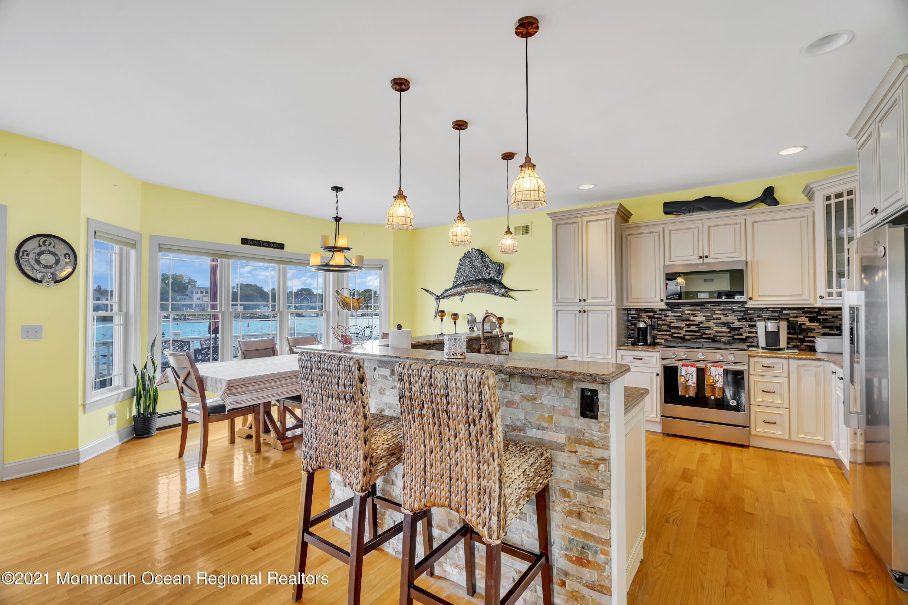 55 Bay Way Brick, NJ 08723 - Photo 8 of 55 a large kitchen with a table and chairs