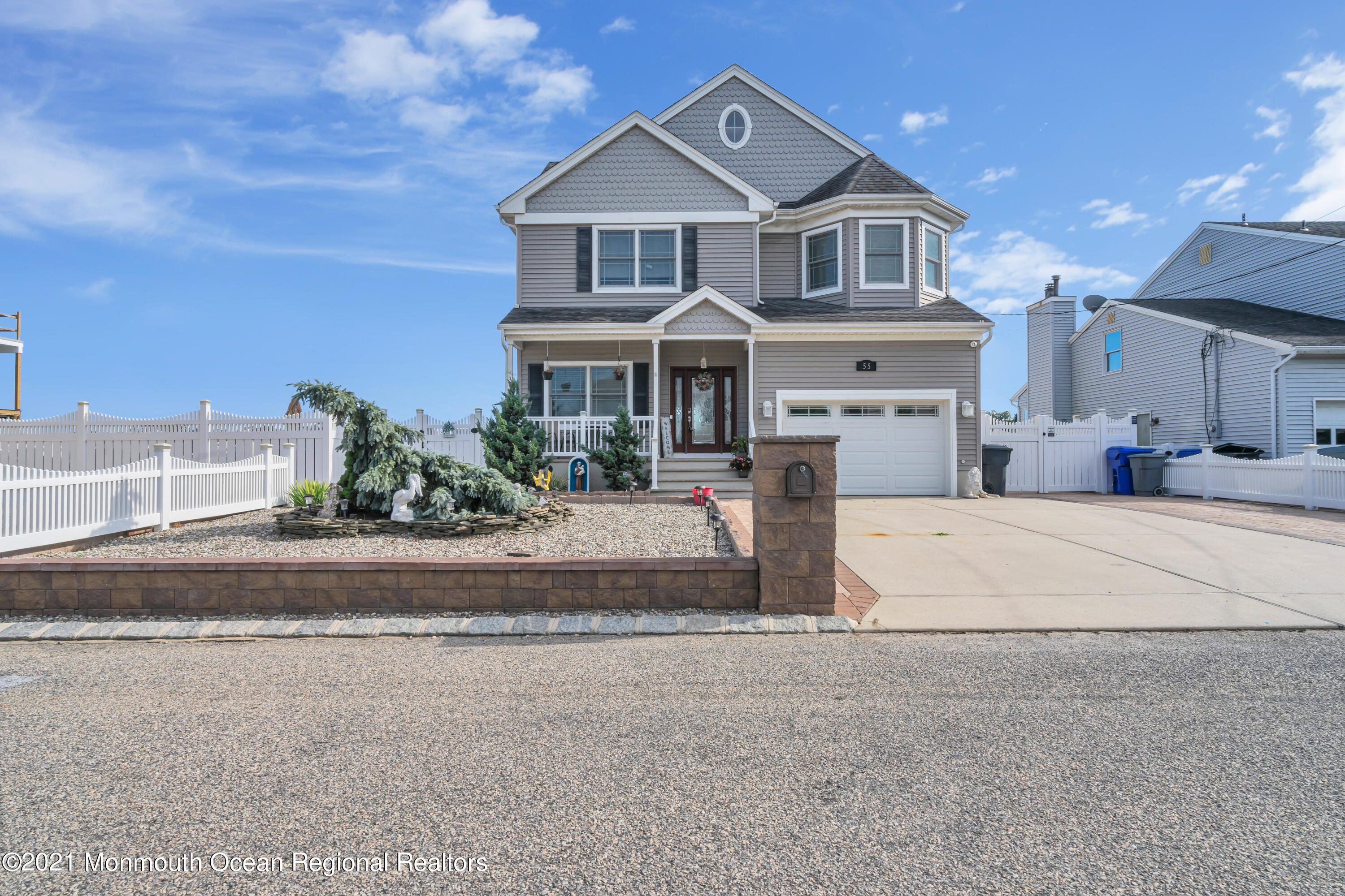55 Bay Way Brick, NJ 08723 - Photo 10 of 55 a front view of a house with a yard