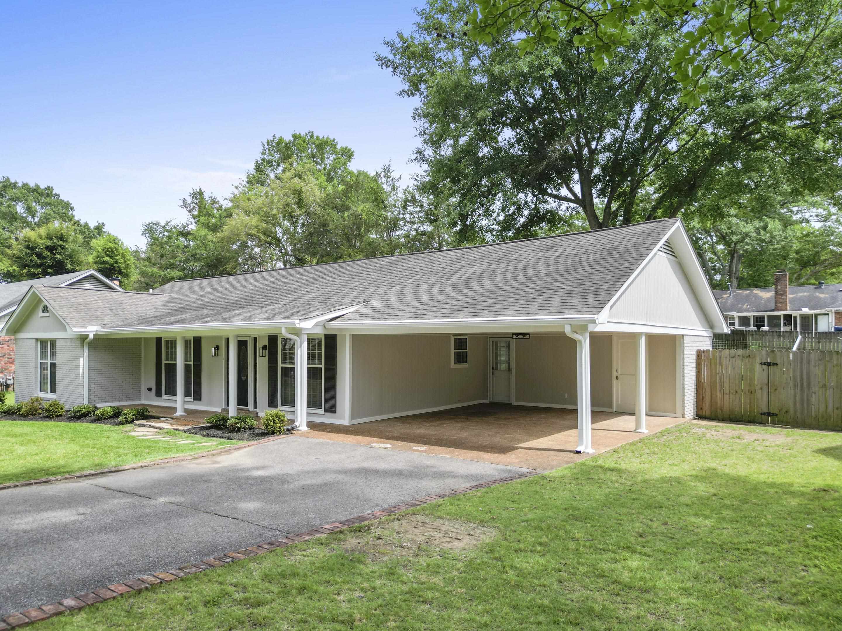 499 Duscoe Street Collierville, TN 38017 - Photo 27 of 38 a front view of house with yard and green space