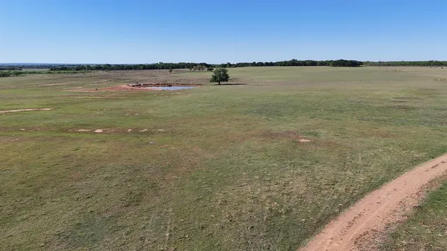 an aerial view of beach and ocean