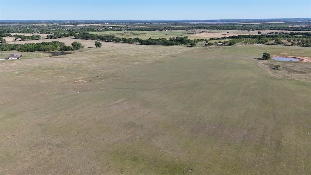 323 County Road 323 Comanche, TX 76442 - Photo 7 of 13 an aerial view of ocean and trees