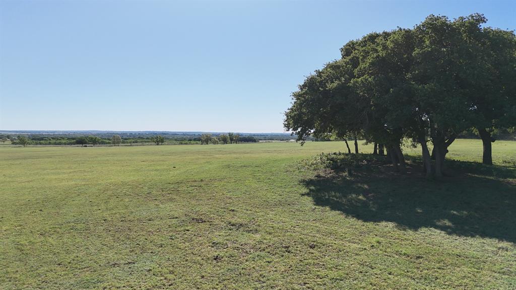 323 County Road 323 Comanche, TX 76442 - Photo 9 of 13 a view of a field with an outdoor space