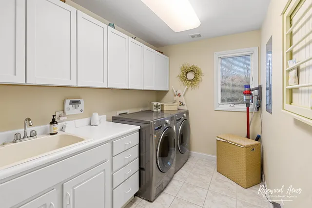 a utility room with dryer and washer