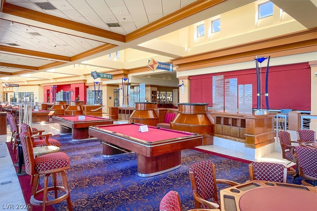1823 Baton Rouge Street Henderson, NV 89052 - Photo 45 of 60 Gleaming wood-trimmed coffered ceilings soar above this expansive recreation room.