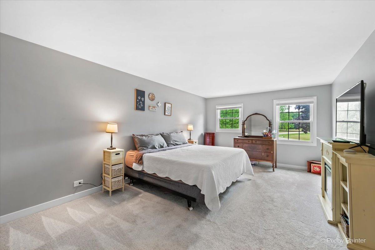 3205 Ramsgate Lane Johnsburg, IL 60051 - Photo 16 of 41 a bedroom with a bed and a window