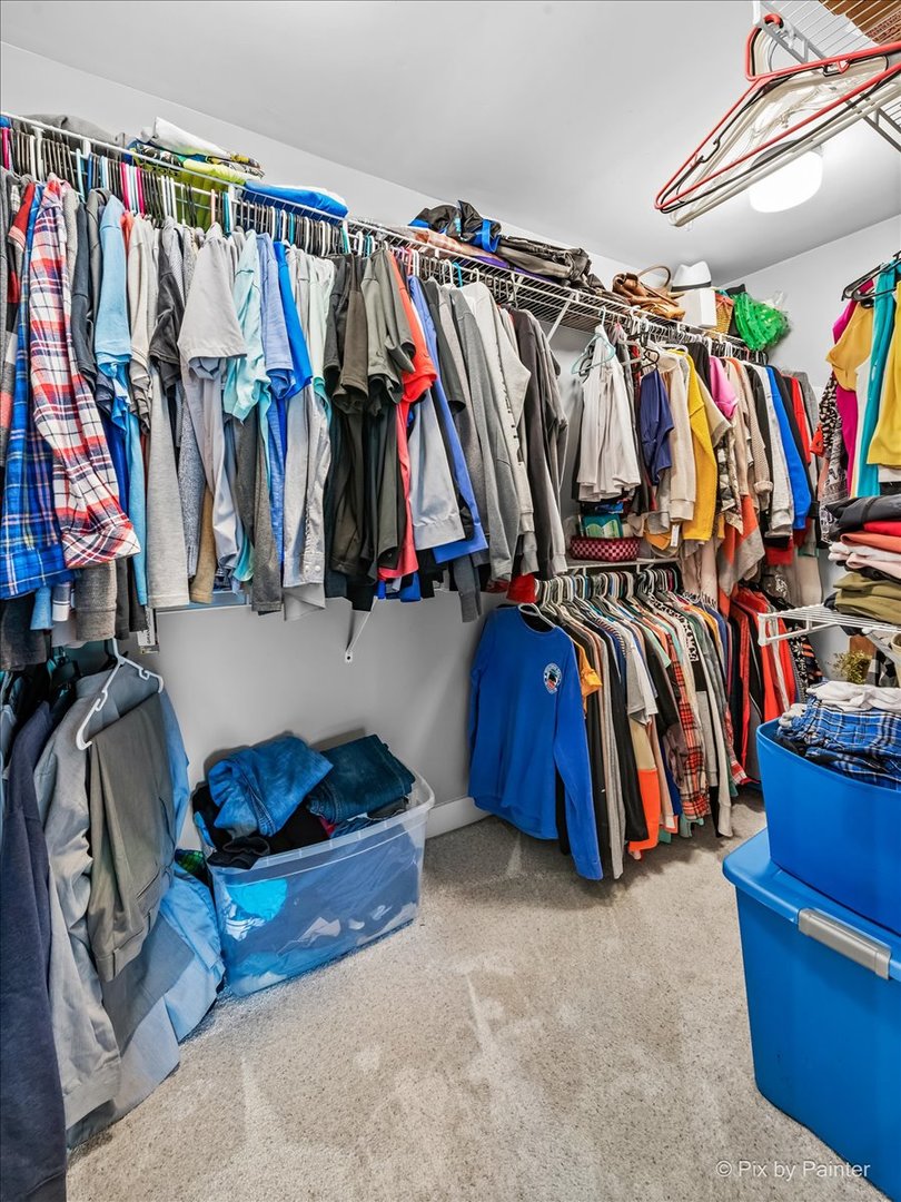 3205 Ramsgate Lane Johnsburg, IL 60051 - Photo 19 of 41 a view of walk in closet with clothes