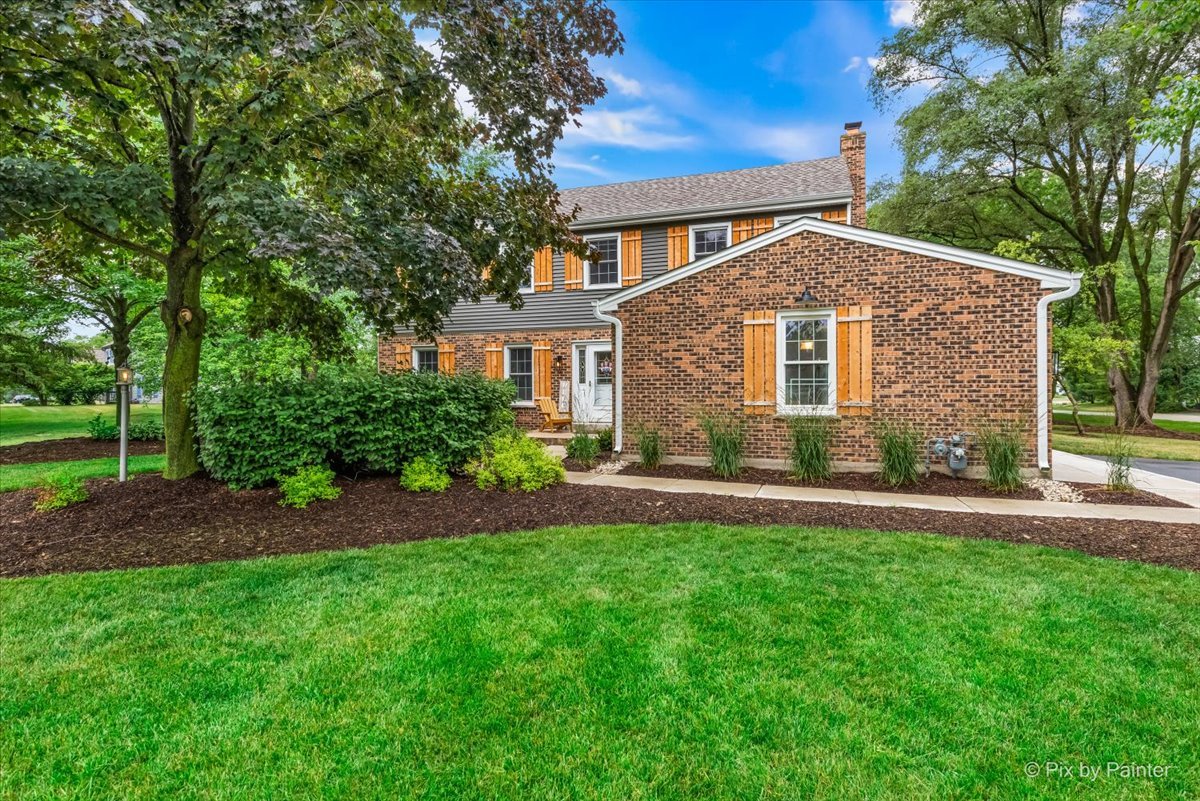 3205 Ramsgate Lane Johnsburg, IL 60051 - Photo 33 of 41 a front view of a house with a yard