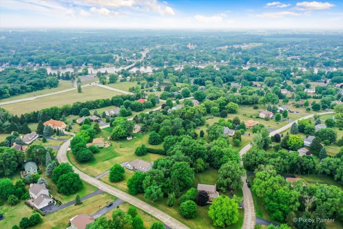 3205 Ramsgate Lane Johnsburg, IL 60051 - Photo 41 of 41 an aerial view of residential houses with outdoor space and trees