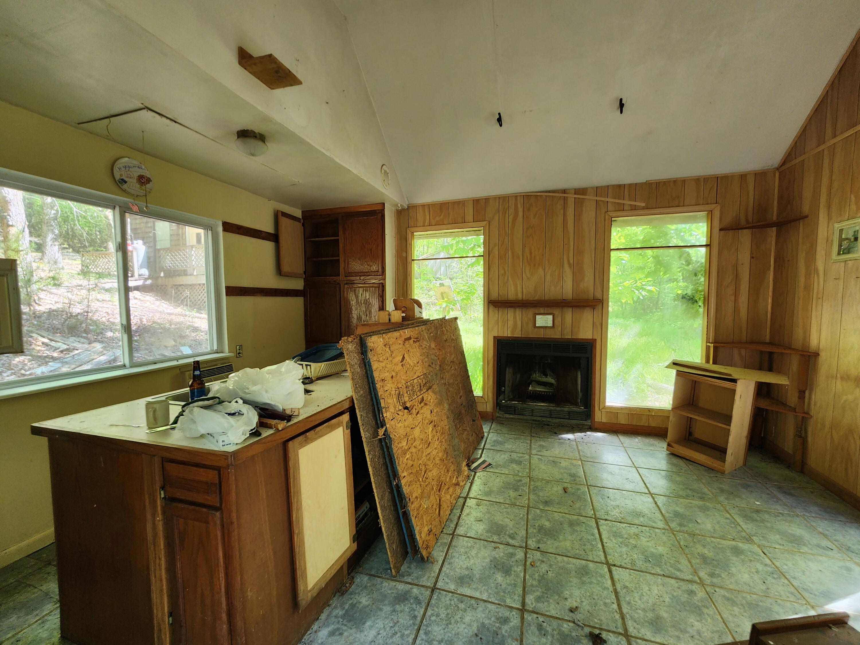 615 Faith Cove Road Sandy Level, VA 24161 - Photo 21 of 49 a dining room with furniture window fireplace