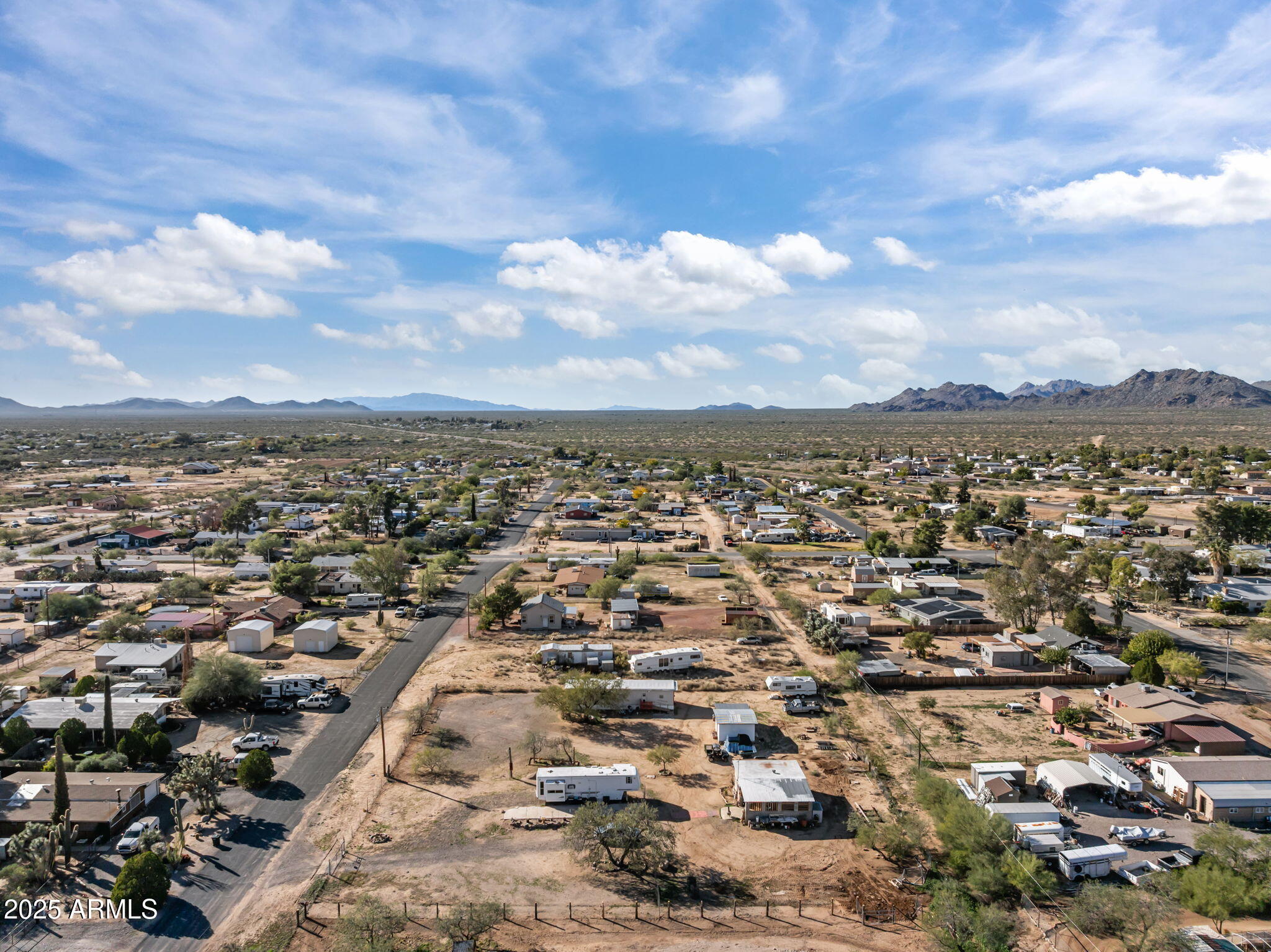 22570 Pacific Street, Unit 7 Congress, AZ 85332 - Photo 2 of 7 an aerial view of multiple house