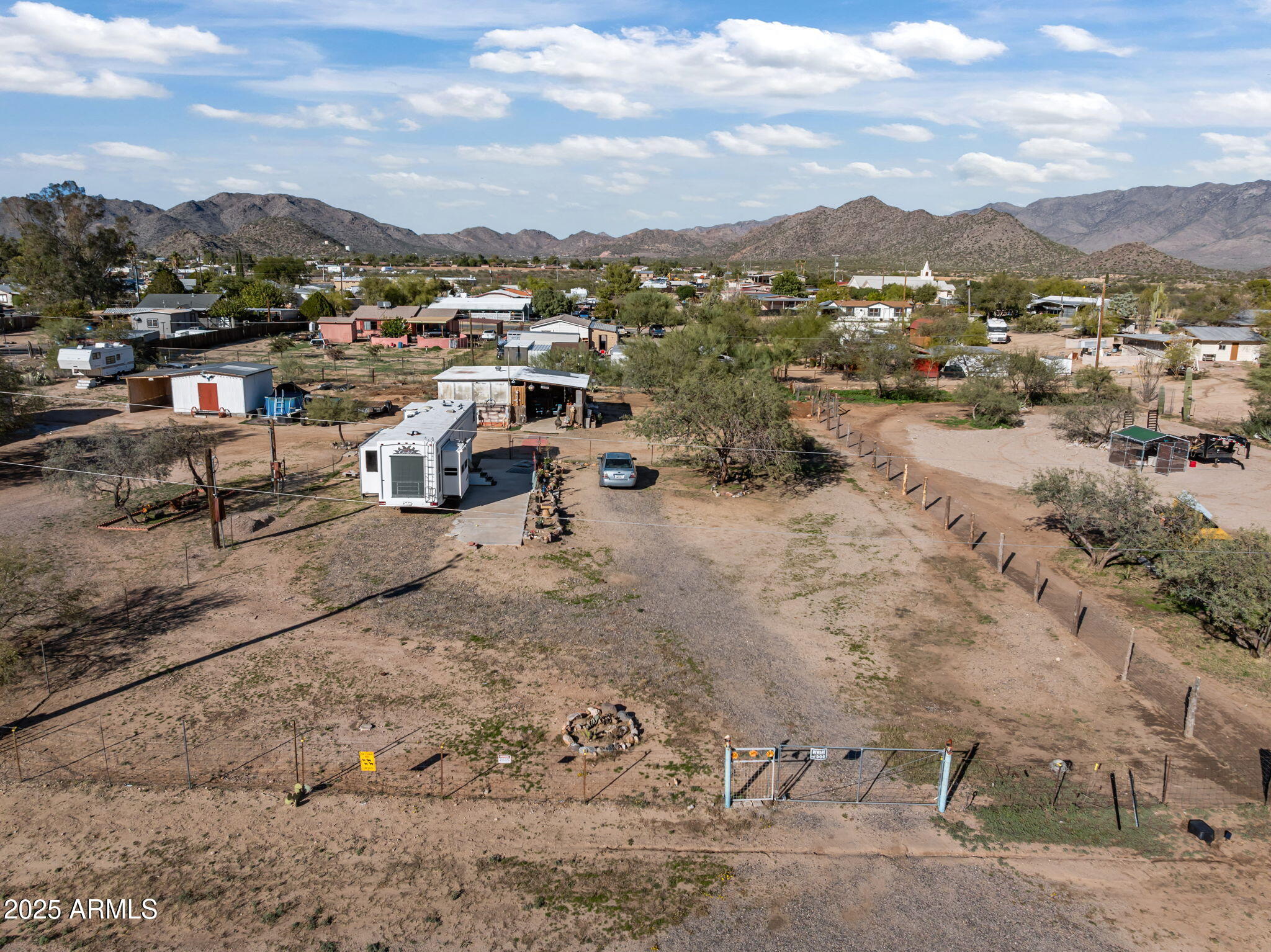 22570 Pacific Street, Unit 7 Congress, AZ 85332 - Photo 7 of 7 a view of a backyard with a mountain